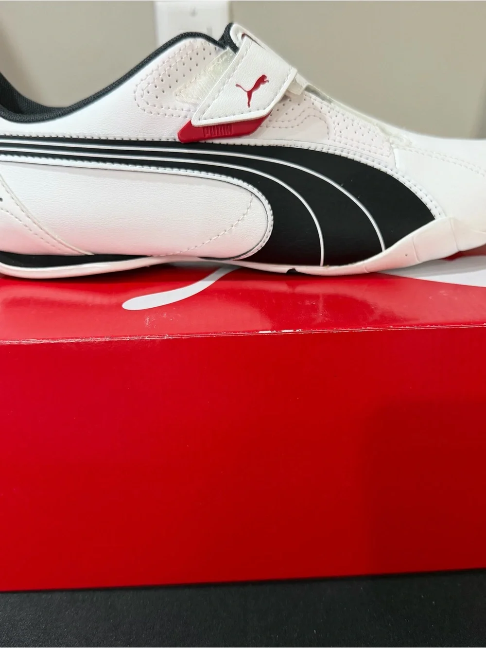 Puma White Slip-On Loafers with Silver Logo